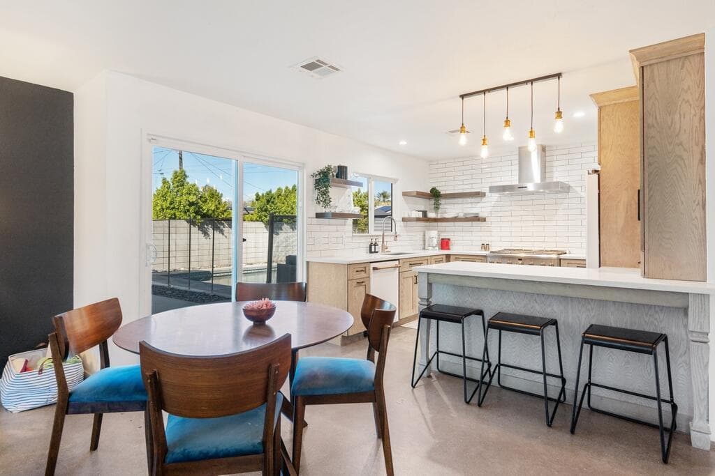 Poolside towels and lemonade in warm sunlight